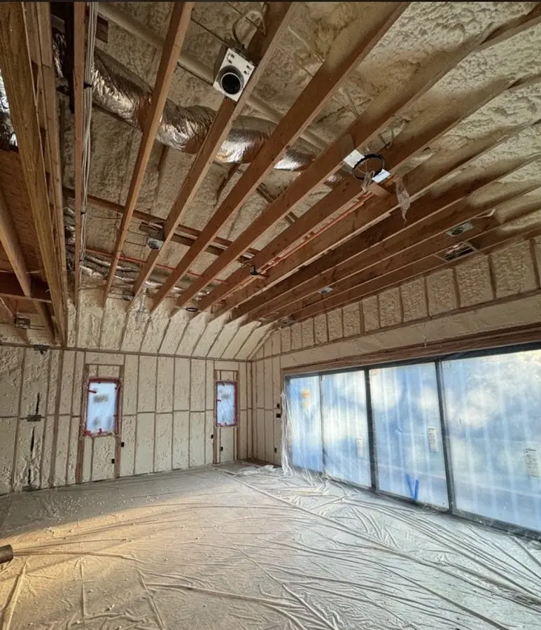 Interior walls and ceiling insulated with spray foam during new construction in Phillipsburg